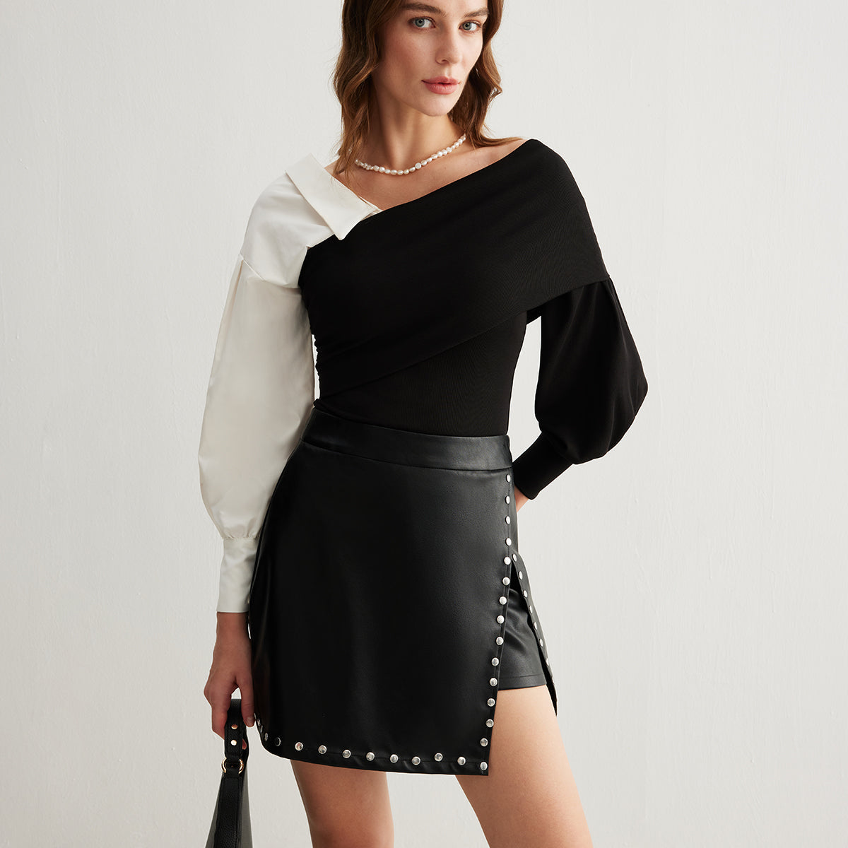 Slit Studded Faux Leather Mini Etek